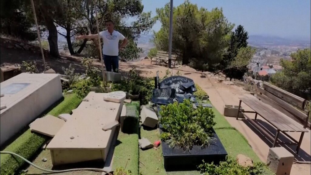 Israeli Settlers Desecrate Palestinian Cemetery in Occupied West Bank Under Military Escort